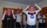 31 July 2020; Dundalk supporters, from left, Owen Fee, former co-owner Paul Brown, Ciaran McIntyre and Gerry Curtis, celebrate after Patrick Hoban of Dundalk scoreed their side's first goal as they watch their side's SSE Airtricity League Premier Division match against St Patrick's Athletic at the home of former Dundalk co-owner Paul Brown in Dundalk, Louth. The match was played behind closed doors due to the ongoing COVID-19 pandemic. Photo by Ben McShane/Sportsfile