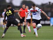 31 July 2020; Patrick McEleney of Dundalk gets past David Titov of St Patrick's Athletic during the SSE Airtricity League Premier Division match between Dundalk and St Patrick's Athletic at Oriel Park in Dundalk, Louth. The SSE Airtricity League Premier Division made its return today after 146 days in lockdown but behind closed doors due to the ongoing Coronavirus restrictions. Photo by Piaras Ó Mídheach/Sportsfile