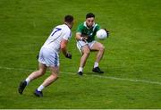 1 August 2020; Dessie Conneely of Moycullen in action against Diarmuid Ó Feinneadha of Mícheál Breathnach's during the Galway County Senior Football Championship Group 2 Round 1 match between Moycullen and Mícheál Breathnach's at Pearse Stadium in Galway. GAA matches continue to take place in front of a limited number of people in an effort to contain the spread of the Coronavirus (COVID-19) pandemic. Photo by Piaras Ó Mídheach/Sportsfile