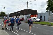 1 August 2020; Erin's Own players cross the road outside the ground as they make their way to Páirc Uí Rinn prior to the Cork County Senior Hurling Championship Group B Round 1 match between Blackrock and Erin's Own. GAA matches continue to take place in front of a limited number of people due to the ongoing Coronavirus restrictions. Photo by Brendan Moran/Sportsfile