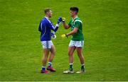 1 August 2020; Mícheál Breathnach's goalkeeper Ronán Ó Beoláin with Paul Kelly of Moycullen after the Galway County Senior Football Championship Group 2 Round 1 match between Moycullen and Mícheál Breathnach's at Pearse Stadium in Galway. GAA matches continue to take place in front of a limited number of people in an effort to contain the spread of the Coronavirus (COVID-19) pandemic. Photo by Piaras Ó Mídheach/Sportsfile