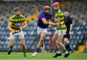 1 August 2020; James O'Carroll of Erin's Own in action against Tadhg Deasy, left, and Alan Connolly of Blackrock during the Cork County Senior Hurling Championship Group B Round 1 match between Blackrock and Erin's Own at Páirc Uí Rinn  in Cork. GAA matches continue to take place in front of a limited number of people due to the ongoing Coronavirus restrictions. Photo by Brendan Moran/Sportsfile