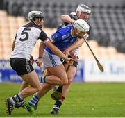 1 August 2020; Jamie Holohan of Erins Own in action against Simon Aylward and Padraic Gahan of Mullinavat during the Kilkenny County Senior Hurling League Group B match between Erins Own and Mullinavat at UPMC Nowlan Park in Kilkenny. GAA matches continue to take place in front of a limited number of people due to the ongoing Coronavirus restrictions. Photo by Matt Browne/Sportsfile