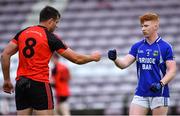 1 August 2020; Mícheál Ó Briain of An Cheathrú Rua and Sam Feerick of Milltown fist bump after the Galway County Senior Football Championship Group 4B Round 1 match between An Cheathrú Rua and Milltown at Pearse Stadium in Galway. GAA matches continue to take place in front of a limited number of people in an effort to contain the spread of the Coronavirus (COVID-19) pandemic. Photo by Piaras Ó Mídheach/Sportsfile