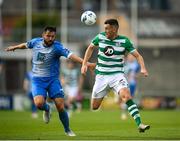 1 August 2020; Aaron Greene of Shamrock Rovers in action against David Webster of Finn Harps during the SSE Airtricity League Premier Division match between Shamrock Rovers and Finn Harps at Tallaght Stadium in Dublin. The SSE Airtricity League Premier Division made its return this weekend after 146 days in lockdown but behind closed doors due to the ongoing Coronavirus restrictions. Photo by Stephen McCarthy/Sportsfile