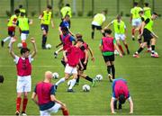 3 August 2020; Players warm-up during a Republic of Ireland Under 15s Assessment Day at the FAI National Training Centre at the Sport Ireland Campus in Dublin. Photo by Ramsey Cardy/Sportsfile