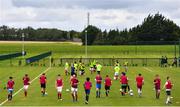 3 August 2020; Players warm-up during a Republic of Ireland Under 15s Assessment Day at the FAI National Training Centre at the Sport Ireland Campus in Dublin. Photo by Ramsey Cardy/Sportsfile