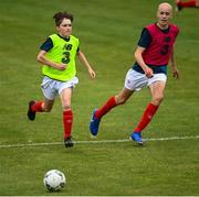 3 August 2020; Brian Moore, yellow, in action against Eamonn Armstrong, red, during a Republic of Ireland Under 15s Assessment Day at the FAI National Training Centre at the Sport Ireland Campus in Dublin. Photo by Ramsey Cardy/Sportsfile