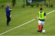 3 August 2020; Sean Mackey, watched by head coach Jason Donohue, during a Republic of Ireland Under 15s Assessment Day at the FAI National Training Centre at the Sport Ireland Campus in Dublin. Photo by Ramsey Cardy/Sportsfile