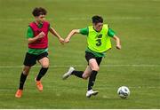 3 August 2020; Cory O'Sullivan, yellow, in action against Naj Razi, red, during a Republic of Ireland Under 15s Assessment Day at the FAI National Training Centre at the Sport Ireland Campus in Dublin. Photo by Ramsey Cardy/Sportsfile