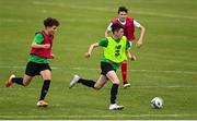 3 August 2020; Cory O'Sullivan, yellow, in action against Naj Razi, red, during a Republic of Ireland Under 15s Assessment Day at the FAI National Training Centre at the Sport Ireland Campus in Dublin. Photo by Ramsey Cardy/Sportsfile