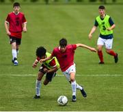 3 August 2020; Aidan Russell, red, in action against Trent Kone Doherty, yellow, during a Republic of Ireland Under 15s Assessment Day at the FAI National Training Centre at the Sport Ireland Campus in Dublin. Photo by Ramsey Cardy/Sportsfile