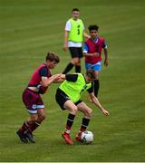 3 August 2020; Cian Spillane, yellow, in action against Ultan McLaughlin, red, during a Republic of Ireland Under 15s Assessment Day at the FAI National Training Centre at the Sport Ireland Campus in Dublin. Photo by Ramsey Cardy/Sportsfile