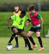3 August 2020; Daniel Isichei, yellow, in action against Naj Razi, red, during a Republic of Ireland Under 15s Assessment Day at the FAI National Training Centre at the Sport Ireland Campus in Dublin. Photo by Ramsey Cardy/Sportsfile