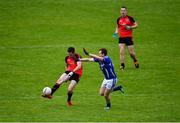 1 August 2020; Jack Ó Gaoithín of An Cheathrú Rua in action against Sean Blake of Milltown during the Galway County Senior Football Championship Group 4B Round 1 match between An Cheathrú Rua and Milltown at Pearse Stadium in Galway. GAA matches continue to take place in front of a limited number of people in an effort to contain the spread of the Coronavirus (COVID-19) pandemic. Photo by Piaras Ó Mídheach/Sportsfile