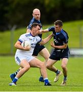 2 August 2020; Darragh Campion of Skryne in action against Nicky O'Brien of Simonstown Gaels during the Meath County Senior Football Championship match between Simonstown Gaels and Skryne at Páirc Tailteann in Navan, Meath. GAA matches continue to take place in front of a limited number of people due to the ongoing Coronavirus restrictions. Photo by Ramsey Cardy/Sportsfile