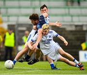 2 August 2020; Shane O'Rourke of Simonstown Gaels in action against Darragh Campion, behind, and Stephen O'Brien of Skryne during the Meath County Senior Football Championship match between Simonstown Gaels and Skryne at Páirc Tailteann in Navan, Meath. GAA matches continue to take place in front of a limited number of people due to the ongoing Coronavirus restrictions. Photo by Ramsey Cardy/Sportsfile