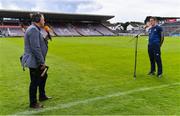 2 August 2020; TG4 presenter Micheál Ó Domhnaill interviews Corofin manager Kevin O'Brien before the Galway County Senior Football Championship Group 4A Round 1 match between Corofin and Oughterard at Pearse Stadium in Galway. GAA matches continue to take place in front of a limited number of people due to the ongoing Coronavirus restrictions. Photo by Piaras Ó Mídheach/Sportsfile