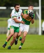 2 August 2020; Barry Hanratty of Castleblaney in action against Conor Duffy of Carrickmacross during the Monaghan Senior Football Championship Group 2 Round 2 match between Carrickmacross Emmets GFC and Castleblayney Faughs at Carrickmacross Emmets GFC in Monaghan. GAA matches continue to take place in front of a limited number of people in an effort to contain the spread of the Coronavirus (COVID-19) pandemic. Photo by Philip Fitzpatrick/Sportsfile