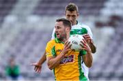 2 August 2020; Micheál Lundy of Corofin in action against Eddie O'Sullivan of Oughterard during the Galway County Senior Football Championship Group 4A Round 1 match between Corofin and Oughterard at Pearse Stadium in Galway. GAA matches continue to take place in front of a limited number of people due to the ongoing Coronavirus restrictions. Photo by Piaras Ó Mídheach/Sportsfile