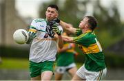 2 August 2020; David Eakin of Carrickmacross in action against Craig Callen of Castleblaney during the Monaghan Senior Football Championship Group 2 Round 2 match between Carrickmacross Emmets GFC and Castleblayney Faughs at Carrickmacross Emmets GFC in Monaghan. GAA matches continue to take place in front of a limited number of people in an effort to contain the spread of the Coronavirus (COVID-19) pandemic. Photo by Philip Fitzpatrick/Sportsfile