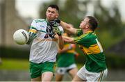 2 August 2020; David Eakin of Carrickmacross in action against Craig Callen of Castleblayney during the Monaghan Senior Football Championship Group 2 Round 2 match between Carrickmacross Emmets GFC and Castleblayney Faughs at Carrickmacross Emmets GFC in Monaghan. GAA matches continue to take place in front of a limited number of people in an effort to contain the spread of the Coronavirus (COVID-19) pandemic. Photo by Philip Fitzpatrick/Sportsfile