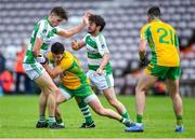 2 August 2020; Michael Farragher of Corofin in action against Matthew Tierney, left, and Ronan Molloy of Oughterard during the Galway County Senior Football Championship Group 4A Round 1 match between Corofin and Oughterard at Pearse Stadium in Galway. GAA matches continue to take place in front of a limited number of people due to the ongoing Coronavirus restrictions. Photo by Piaras Ó Mídheach/Sportsfile