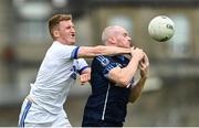 2 August 2020; Brian Davis of Skryne in action against Sean Tobin of Simonstown Gaels during the Meath County Senior Football Championship match between Simonstown Gaels and Skryne at Páirc Tailteann in Navan, Meath. GAA matches continue to take place in front of a limited number of people due to the ongoing Coronavirus restrictions. Photo by Ramsey Cardy/Sportsfile