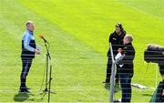 2 August 2020; Simonstown Gaels manager Des Lane is interviewed by TG4 commentator Marcus Ó Buachalla ahead of the Meath County Senior Football Championship match between Simonstown Gales and Skryne at Páirc Tailteann in Navan, Meath. GAA matches continue to take place in front of a limited number of people due to the ongoing Coronavirus restrictions. Photo by Ramsey Cardy/Sportsfile