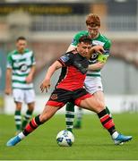 2 August 2020; Chris Lyons of Drogheda United in action against Darragh Nugent of Shamrock Rovers II during the SSE Airtricity League First Division match between Shamrock Rovers II and Drogheda United at Tallaght Stadium in Dublin. The SSE Airtricity League made its return this weekend after 146 days in lockdown but behind closed doors due to the ongoing Coronavirus restrictions. Photo by Seb Daly/Sportsfile
