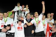 30 October 2010; John Hume, SDLP founder and co-recipient of the 1998 Nobel Peace Prize, celebrates with Derry City players after winning the Airtricity League First Division following their match against Monaghan United at Gortakeegan in Monaghan. Photo by Oliver McVeigh/Sportsfile