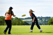3 August 2020; Scorchers players Leah Paul, right, and Shauna Kavanagh warm-up by playing frisbie prior to the Women's Super Series match between Typhoons and Scorchers at Oak Hill Cricket Ground in Kilbride, Wicklow. Photo by Seb Daly/Sportsfile