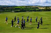 3 August 2020; Typhoons players warm-up prior to their Women's Super Series match against Scorchers at Oak Hill Cricket Ground in Kilbride, Wicklow. Photo by Seb Daly/Sportsfile
