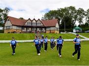 3 August 2020; Typhoons players make their way out onto the field during the Women's Super Series match between Typhoons and Scorchers at Oak Hill Cricket Ground in Kilbride, Wicklow. Photo by Seb Daly/Sportsfile