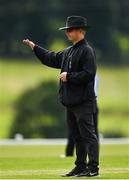 3 August 2020; Umpire Paul Reynolds signals a boundary during the Women's Super Series match between Typhoons and Scorchers at Oak Hill Cricket Ground in Kilbride, Wicklow. Photo by Seb Daly/Sportsfile