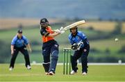 3 August 2020; Gaby Lewis of Scorchers plays a shot, watched by Typhoons wicket-keeper Amy Hunter, during the Women's Super Series match between Typhoons and Scorchers at Oak Hill Cricket Ground in Kilbride, Wicklow. Photo by Seb Daly/Sportsfile