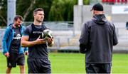 3 August 2020; John Cooney, left, in conversation with head coach Dan McFarland during Ulster Rugby squad training at Kingspan Stadium in Belfast. Photo by Robyn McMurray for Ulster Rugby via Sportsfile