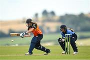 3 August 2020; Alana Dalzell of Scorchers plays a shot, watched by Typhoons wicket-keeper Amy Hunter, during the Women's Super Series match between Typhoons and Scorchers at Oak Hill Cricket Ground in Kilbride, Wicklow. Photo by Seb Daly/Sportsfile