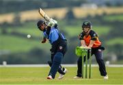 3 August 2020; Amy Hunter of Typhoons plays a shot, watched by Scorchers wicker-keeper Shauna Kavanagh, during the Women's Super Series match between Typhoons and Scorchers at Oak Hill Cricket Ground in Kilbride, Wicklow. Photo by Seb Daly/Sportsfile