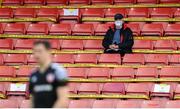 3 August 2020; A spectator during the SSE Airtricity League Premier Division match between St Patrick's Athletic and Derry City at Richmond Park in Dublin. Photo by Stephen McCarthy/Sportsfile
