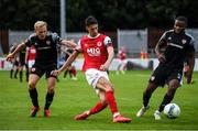 3 August 2020; Shane Griffin of St Patrick's Athletic in action against Conor McCormack, left, and James Akintunde of Derry City during the SSE Airtricity League Premier Division match between St Patrick's Athletic and Derry City at Richmond Park in Dublin. Photo by Stephen McCarthy/Sportsfile