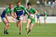 2 August 2020; Cian Byrne of Sarsfields in action against Shane Flanagan, left, and Paul Cribbin of Johnstownbridge during the Kildare Senior Football Championship Group C Round 1 match between Sarsfields and Johnstownbridge at St. Conleth’s Park in Newbridge, Kildare. GAA matches continue to take place in front of a limited number of people due to the ongoing Coronavirus restrictions. Photo by Brendan Moran/Sportsfile