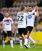 7 August 2020; Michael Duffy is congratulated by his Dundalk team-mate Stefan Colovic after scoring his side's first goal during the SSE Airtricity League Premier Division match between Bohemians and Dundalk at Dalymount Park in Dublin. Photo by Stephen McCarthy/Sportsfile