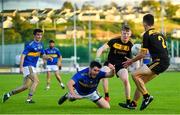 7 August 2020; Ryan McHugh of Kilcar in action against Kevin Kealy, left, and Peter Devine of St Eunan's during the Donegal County Senior Football Championship Round 1 match between St Eunan's and Kilcar at O'Donnell Park in Letterkenny, Donegal. Photo by Ramsey Cardy/Sportsfile