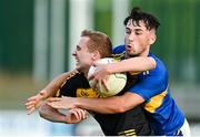 7 August 2020; Brian McIntyre of St Eunan's is tackled by Oran Doogan of Kilcar during the Donegal County Senior Football Championship Round 1 match between St Eunan's and Kilcar at O'Donnell Park in Letterkenny, Donegal. Photo by Ramsey Cardy/Sportsfile