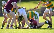 8 August 2020; Niall Kenny of Borris-Ileigh holds onto possession while on the ground as he is tackled by Burgess players Johnny Mulqueen, second from right, and Daire Hogan, second from left, during the Tipperary County Senior Hurling Championship Group 4 Round 2 match between Borris-Ileigh and Burgess at McDonagh Park in Nenagh, Tipperary. Photo by Piaras Ó Mídheach/Sportsfile