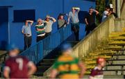 8 August 2020; Supporters shield their eyes from the sun as they watch the Tipperary County Senior Hurling Championship Group 4 Round 2 match between Borris-Ileigh and Burgess at McDonagh Park in Nenagh, Tipperary. Photo by Piaras Ó Mídheach/Sportsfile