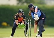 9 August 2020; Louise Little of Typhoons plays a shot as Shauna Kavanagh of Scorchers watches on during the Women's Super Series match between Scorchers and Typhoons at Pembroke Cricket Club in Park Avenue, Dublin. Photo by Sam Barnes/Sportsfile