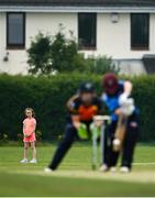 9 August 2020; Leah Whaley, aged 7, from Sandymount in Dublin watches on as Celeste Raack of Typhoons bats during the Women's Super Series match between Scorchers and Typhoons at Pembroke Cricket Club in Park Avenue, Dublin. Photo by Sam Barnes/Sportsfile