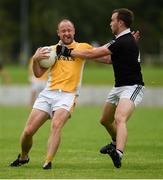 9 August 2020; Vincent Corey of Clontibret O'Neills in action against Paul McArdle of Magheracloone Mitchell's during the Monaghan Senior Football Championship Group 1 Round 3 match between Clontibret O'Neills and Magheracloone Mitchell's at Clontibret O'Neills GAA Club in Clontibret, Monaghan. Photo by Philip Fitzpatrick/Sportsfile